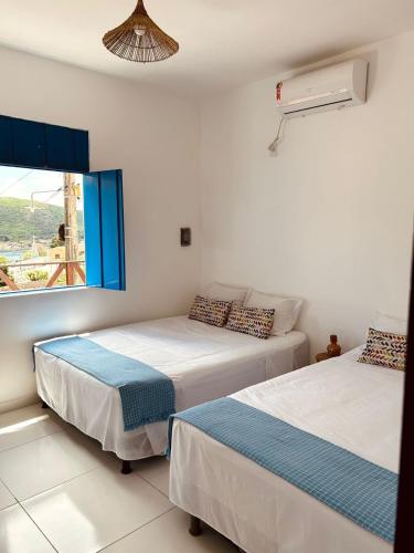 Кровать или кровати в номере Casa do Alto Piranhas