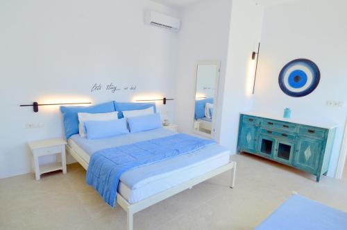 Ένα ή περισσότερα κρεβάτια σε δωμάτιο στο ANIMA family apartment