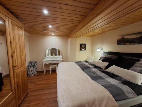 Postel nebo postele na pokoji v ubytování Ferienwohnung-Haus-am-Wald