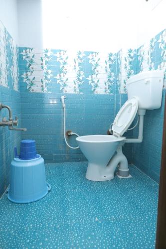 Koupelna v ubytování Bhudeve Stay Home