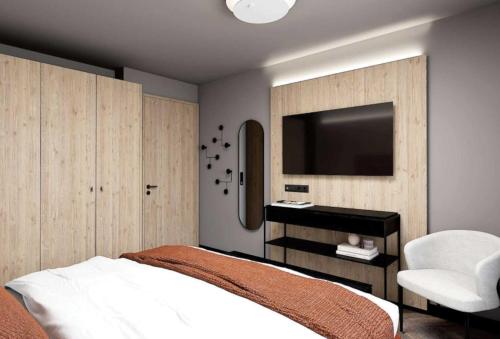 Postel nebo postele na pokoji v ubytování Grünwald Resort Sölden