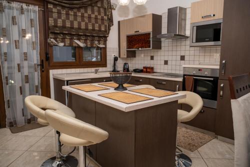 Kuchyň nebo kuchyňský kout v ubytování PoppysHouse