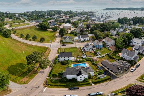 an aerial view of a neighborhood with houses and a street at Whalers Rest A Bright and Historic 2BR Flat in Stonington Borough in Stonington