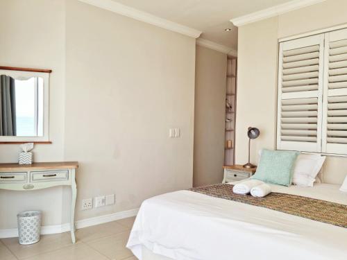 Ένα ή περισσότερα κρεβάτια σε δωμάτιο στο Penthouse on the beach, Jacuzzi with 3 bedrooms