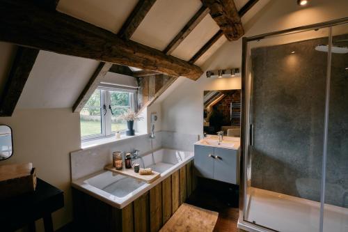 Et badeværelse på Boutique Country Cottage