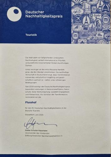 a white envelope with a piece of paper at Der Flusshof, Scheunenwohnung in Werben