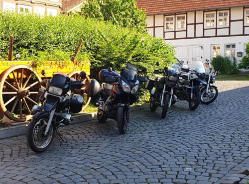 a group of motorcycles parked in front of a building at Gutsherrn Klause in Rotenburg an der Fulda