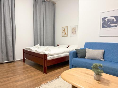 Giường trong phòng chung tại 2 bedrooms & free parking