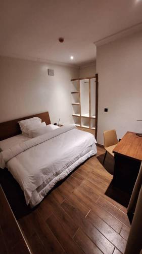 Postel nebo postele na pokoji v ubytování Cocopark Hotel