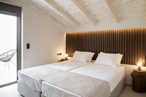Ένα ή περισσότερα κρεβάτια σε δωμάτιο στο Aria al Mare Villa