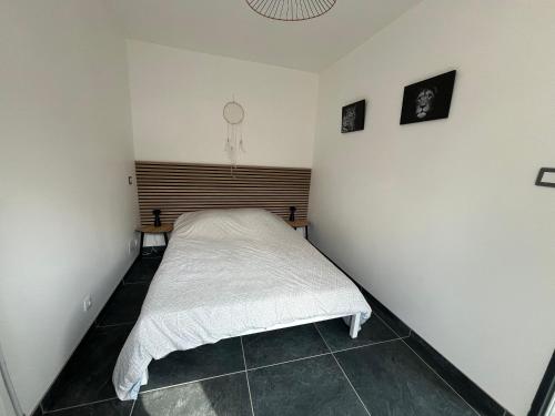 Postel nebo postele na pokoji v ubytování Maison Gali