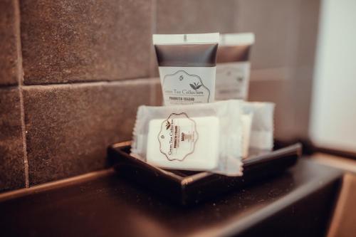 two boxes of soap sitting on top of a counter at Hotel Transit in Barcelona
