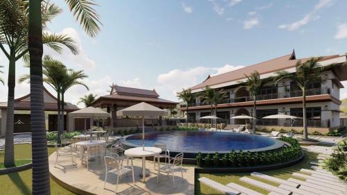un resort con piscina e un edificio di Paradise Mountain View Resort a Vang Vieng