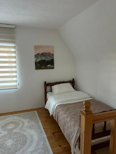 Postel nebo postele na pokoji v ubytování Stone House - Virak