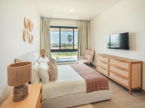 Apartment with balcony and pool view in Cap Cana