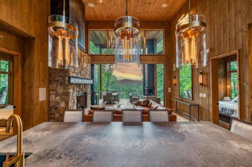 a large dining room with a large table and chairs at Greenridge- Upscale Architecture and Modern Design in Blue Ridge
