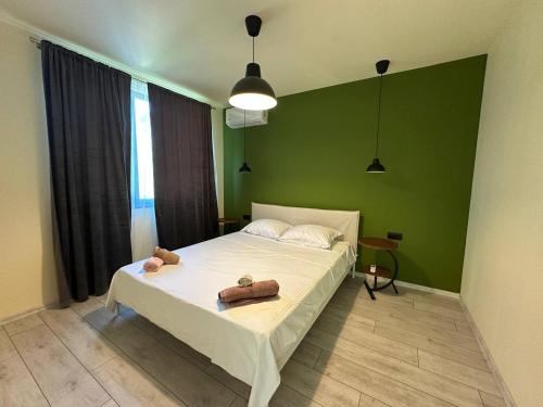 En eller flere senge i et værelse på Petra e Mare