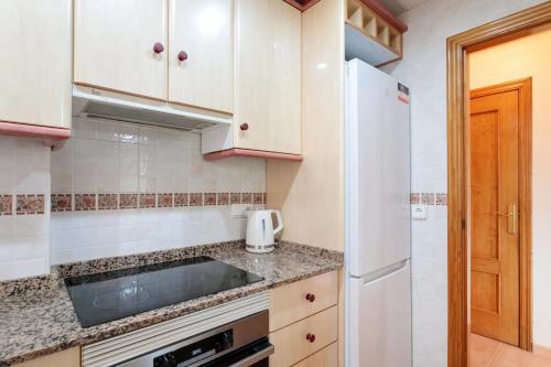 Η κουζίνα ή μικρή κουζίνα στο Pretty Bungalow With Private Garden