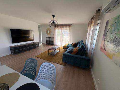 Le luxe au pied du pilat - 6 voyageursにあるテレビまたはエンターテインメントセンター