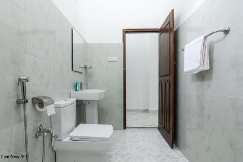 Koupelna v ubytování White Pearl Hotel