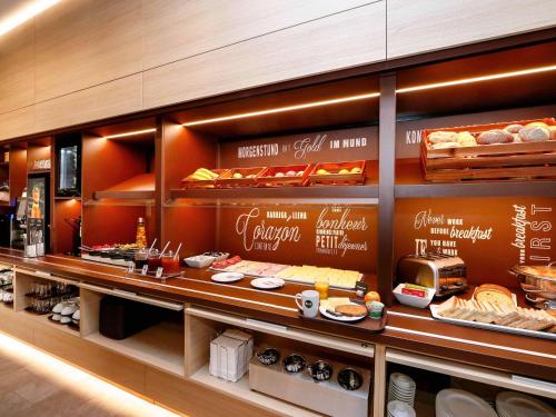 a display case in a fast food restaurant at B&B HOTEL Klagenfurt-City in Klagenfurt