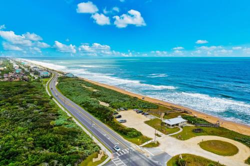 an overhead view of a road and the ocean at Ocean Jewel Condo Unit 303 in Daytona Beach