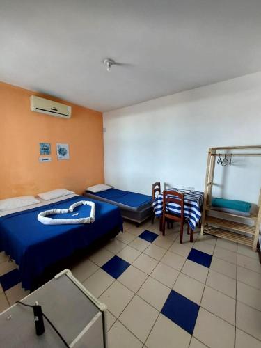 Postel nebo postele na pokoji v ubytování Pousada MARIA BONITA