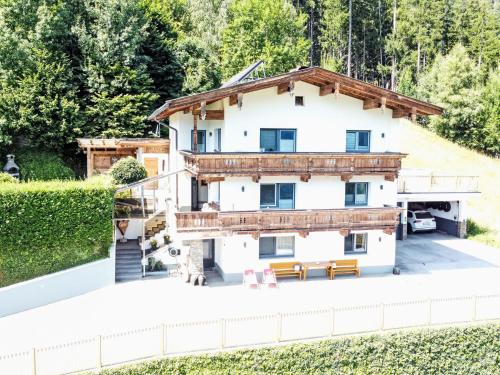 a house with a view of the backyard at Apartment Bettina by Interhome in Aschau