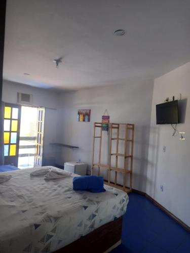 Postel nebo postele na pokoji v ubytování Pousada MARIA BONITA