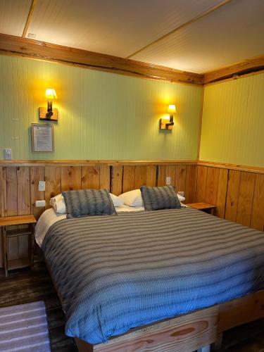 Postel nebo postele na pokoji v ubytování Hotel Lawenco
