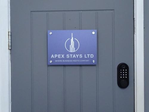 a sign on a door that says apex stays id at The Orange Outpost 8a - City Centre in Bradford