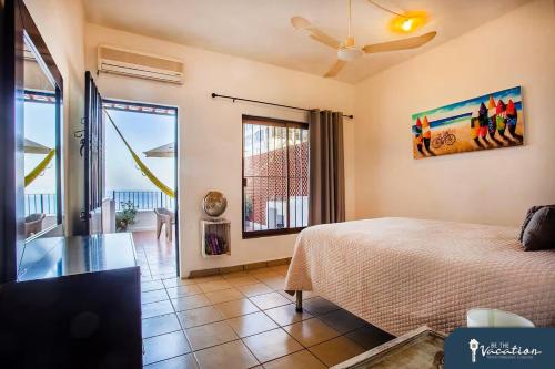 Katil atau katil-katil dalam bilik di Cozy Studio with Ocean View