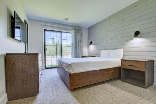 Ένα ή περισσότερα κρεβάτια σε δωμάτιο στο Pocono Mountain Villas by Exploria Resorts