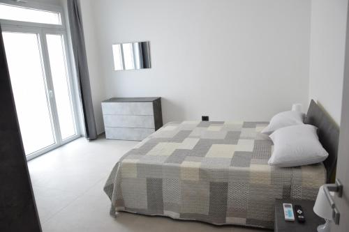 Postel nebo postele na pokoji v ubytování Casa Kris