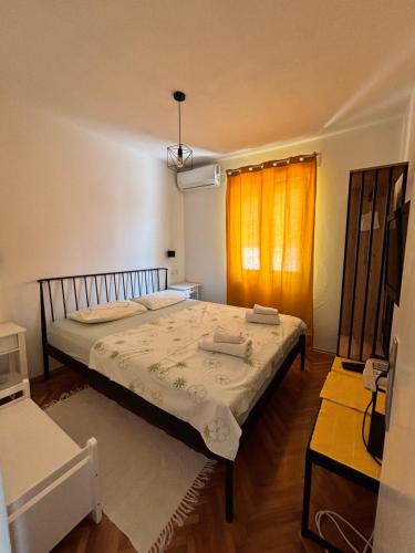 Ένα ή περισσότερα κρεβάτια σε δωμάτιο στο Apartment Marevic