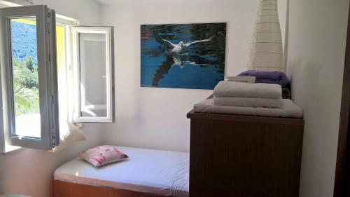 A bed or beds in a room at Apartments Mediterranea