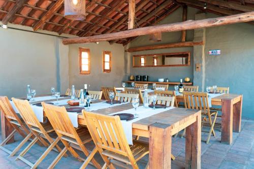 Un restaurante u otro lugar para comer en MAE Singular Hotel