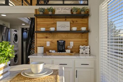 a kitchen with a counter with a coffee maker on it at Shadowrock - Luxury Tiny Home with Amazing Views in Yanush
