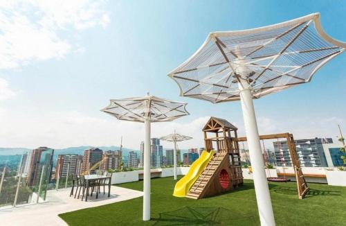 Детская игровая зона в Apartamento con vista al Aeropuerto zona 13 Narama #217