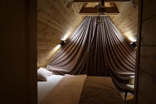 Postel nebo postele na pokoji v ubytování Chalet Hill Zabljak
