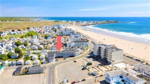 an aerial view of a beach and the ocean at Stay Steps from Beach with Pool AC Parking in Hampton