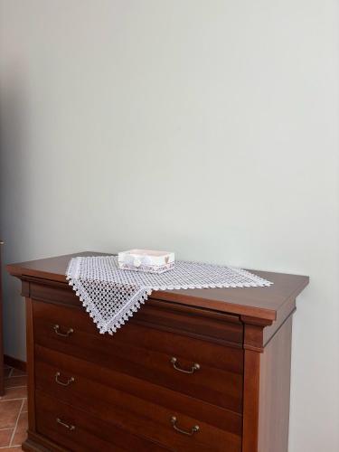 a wooden dresser with a counter top on top of it at Casale dei Gelsomini - Country House in Poggio