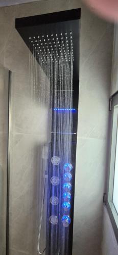 a shower with a bunch of water in it at Thalori Suites in Kalamata