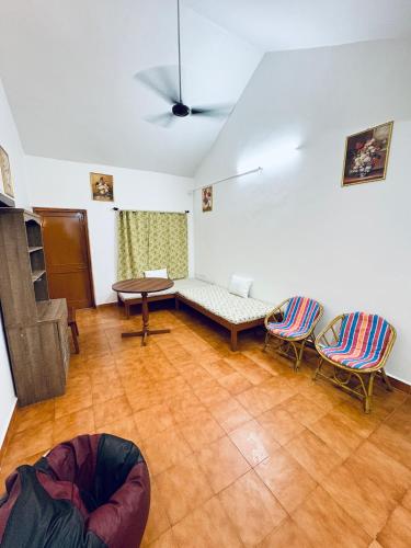 a living room with a couch and two chairs at Tony apartment baga in Baga