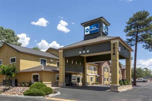 a hotel building with a clock tower on top of it at Best Western Inn of Payson in Payson