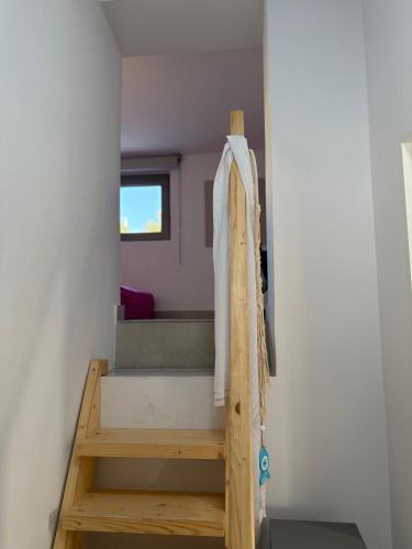 Ένα ή περισσότερα κρεβάτια σε δωμάτιο στο Villa Isabella Aegina