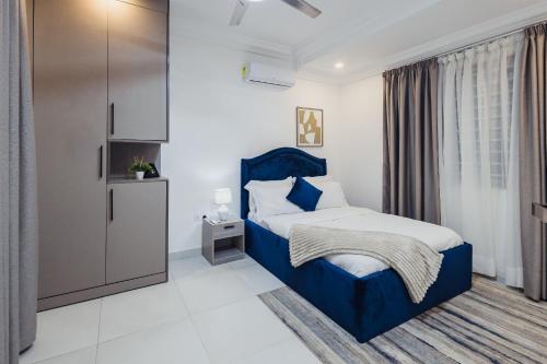 Una cama o camas en una habitación de Imperial Eminence