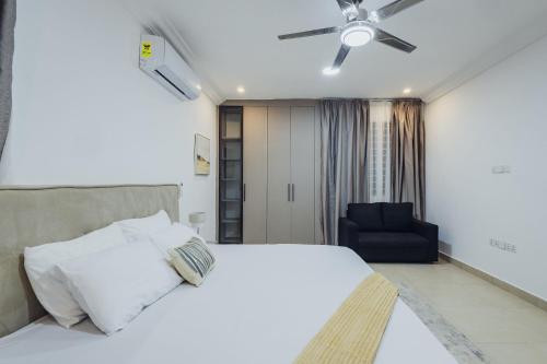 Una cama o camas en una habitación de Imperial Eminence