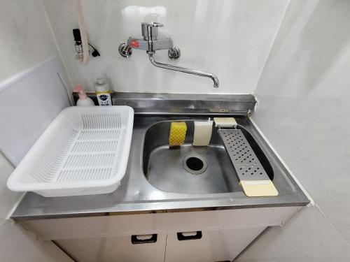 Η κουζίνα ή μικρή κουζίνα στο Marbury Heights Kotsutsu - Vacation STAY 92150v