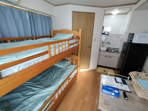 Ένα ή περισσότερα κρεβάτια σε δωμάτιο στο Marbury Heights Kotsutsu - Vacation STAY 92150v